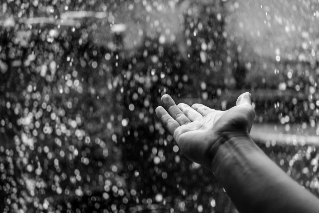 Hand catching rain